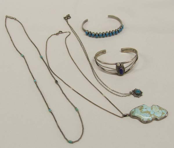 5 Pieces Navajo & Zuni Jewelry, 21'' Longest: 5 Pieces Navajo & Zuni Jewelry. Longest necklace (21'') is liquid silver and turquoise beads. Bracelets are 6'' and 6.25''. SHI $15.