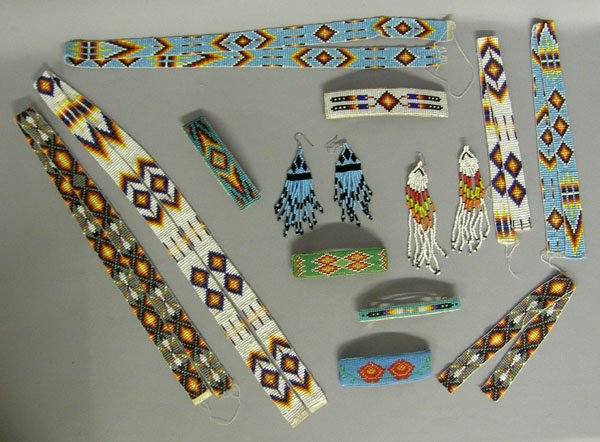 13 Plains Indian Beadwork Longest strap is 35'': 13 Plains Indian Beadwork. 2 pr pierced Earrings, 6 Hand Beaded straps that could be made into belts, Longest 35'' and 5 hari barrettes. SHI $15.