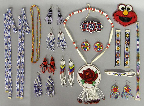 17 Plains Indian Assorted Beadwork: Assortment 17 Beaded Jewelry, 2 nceklaces including a Rose Medallion Necklace with a 4'' pendant, 6 pr. pierced earrings, 1 barrette, 5 beaded straps that could be used for clothing decor or belts. On