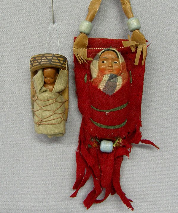 Hopi & Skookum Miniature Cradle Dolls 9'' Largest: 2 Miniature Cradle Dolls 9'' Largest. One is a Hopi Pottery Cradleboard. SHI $20.