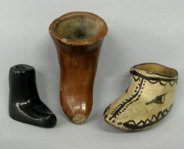 3 Miniature Santo Clara & Cochiti Pottery Boots 3.5''H: 3 Miniature Pueblo Pottery Boots 3.5'' Largest. Cochiti, Santa Clara. Red boot has chip on toe. SHI $25.