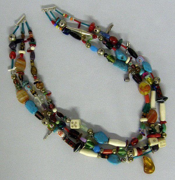 Sante Fe 3 Strand Treasure Necklace 22'' Long: Sante Fe 3 Strand Treasure Necklace 22'' Long. Dominican Republic Amber, Turquoise, Bone, Silver, Glass & More Teasures. SHI $15.