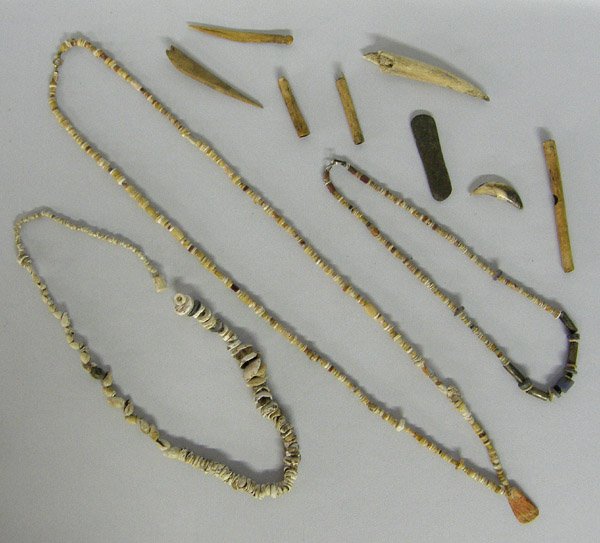 Prehistoric Heishi Necklaces Plus Tools & Artifacts: Prehistoric Shell Heishi Necklaces Plus Tools & Bead Articats. Assorted beads, bone bird whistle, bone needle,punch and awl. Longest necklace is 32''. SHI $15.
