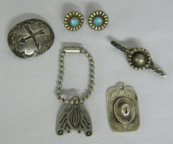 5 Vintage New Mexico Keychain, Fob, Pins, Earrings: 5 Vintage Pieces of New Mexico Jewelry to include Cowboy Sterling Silver Keychain, Cowboy Fob, Navajo Concho made into a Pin, Vintage Pierced Navajo Earrings, 1 1/5''. SHI $15.