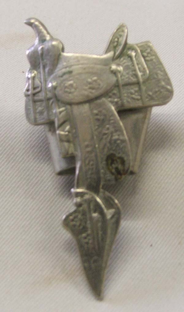 Keystone Bros. Cowboy Saddle Bolo Slide: Vintage Keystone Bros., San Francisco, Calif. Cowboy Bolo Saddle Slide 2 inches. SHI $15.