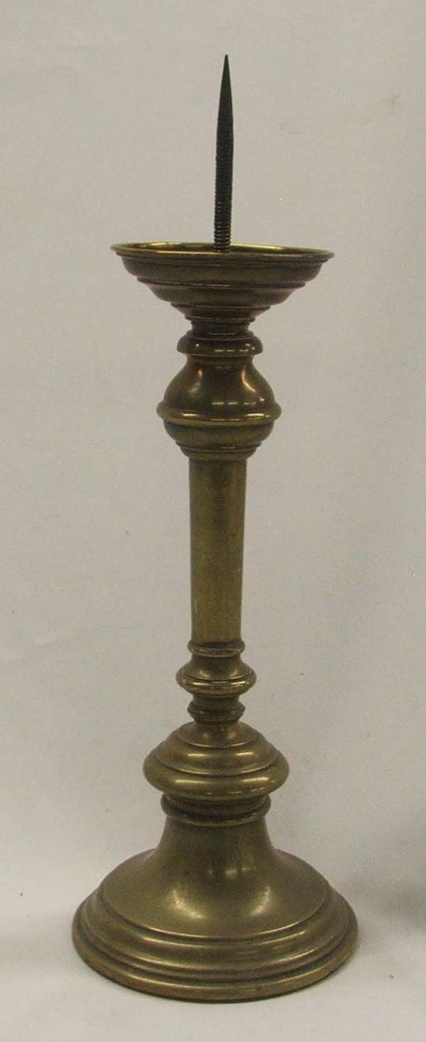 Antique Spanish Brass Candle Stick Holder: Spanish Brass Candle Stick Holder 12 Inches (including spindle). Slight damage to base of holder on one side as shown in picture. 12"H SHI $20.
