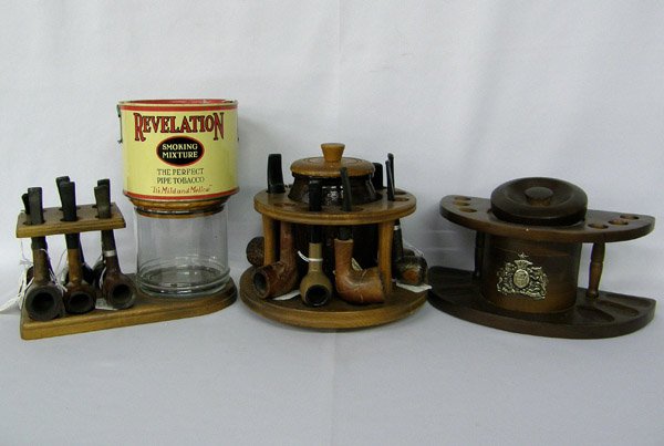Vintage Collection of Pipes plus Holders : Vintage Pipes (12), 3 Racks W/Humidors, and a ''Revelation'' Tobacco Can. Pipes include: Dr. Grabow, Signature Briar, John Survey, Italian Malibou, Ladies pipes, Medco, Masterson Freehand Burled Briar