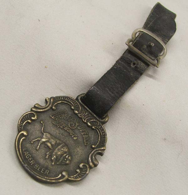 Antique East Buffalo Brewery Watch Fob: Vintage East Buffalo Brewing Co, Watch Fob 4.75 inches. Vintage Leather Fob in good condition. SHI $15.