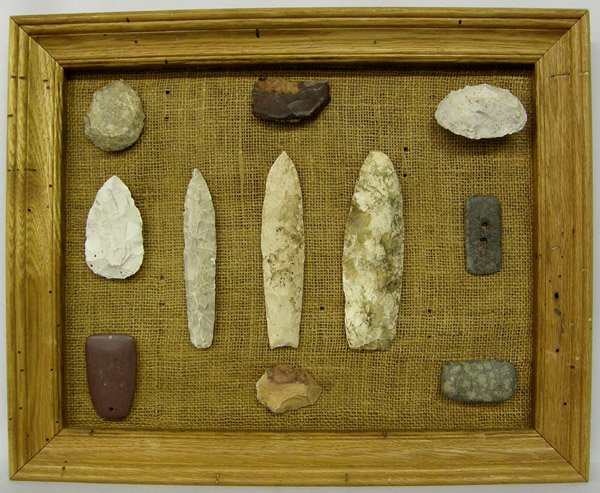Framed Collection 11 Artifacts, Spear Points : Framed Collection of 11 Artifacts, Spear Points, Largest is 7.5'' x 2.25''. Some are prehistoric, some not. SHI $35.