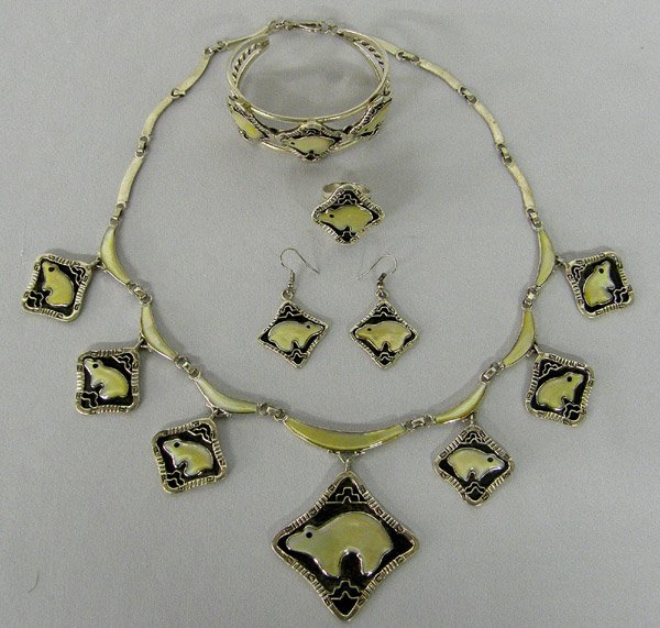 4 pc Navajo MOP Onyx Bear Jewelry Set : 4 Piece Set Navajo Hallmarked DC Sterling Matching Mother Of Pearl Silver Bear Jewelry set to include: Necklace 18'' end to end with a pendant 2.25'' L, Pr. pierced earrings, bracelet inside measureme