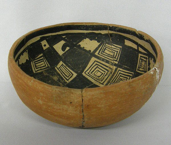 Prehistoric Gila Black on Buff Pottery Bowl: Prehistoric Gila Pottery Bowl 3 x 6.5 inches. Has been glued, some missing pieces. Checkered Board Maze pattery. SHI $25.