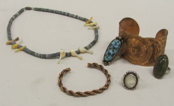6 New Mexico Native American Jewelry: 6 New Mexico Native American Jewelry. 3 Navajo Rings Largest Size 7.5 the turquoise is 1.5''L. Navajo mother of pearl Bird and Heishi bead necklace and 2 copper bracelets. SHI $15.