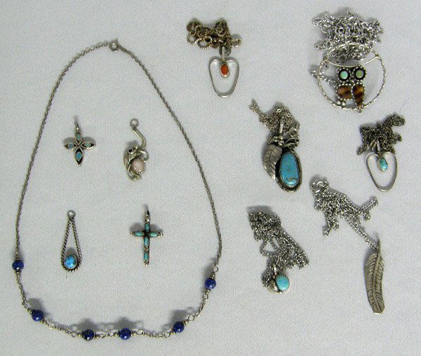 11 Navajo Necklaces & Pendants plus: 11 Necklaces & Pendants, Southwest Style, 7 Pendants on chains longest 23 1/2'', 4 Pendants with no chains largest 1 1/3''. SHI $15.