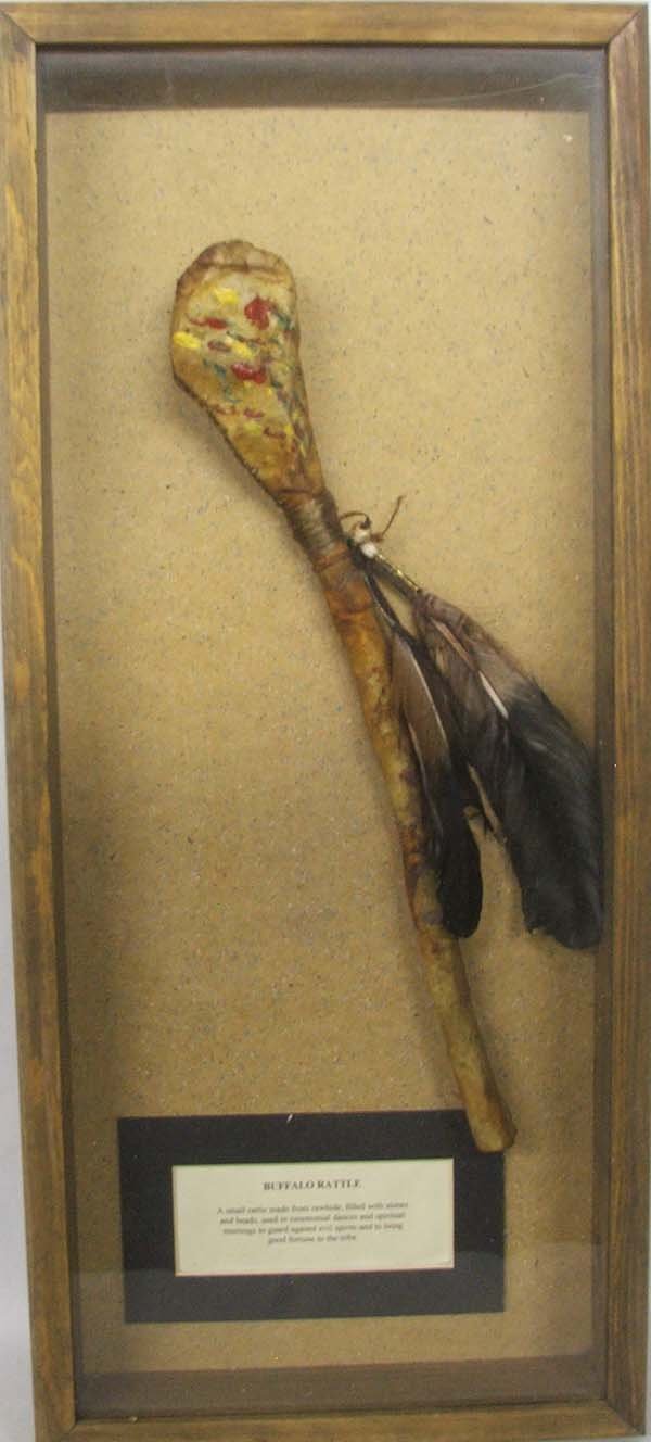 Buffalo Rattle From Dances With Wolves: Buffalo Rattle From Dances With Wolves, prop over run, with certificate of Authenticity. Measures approx. 24 3/4''L x 11''W x 2''D. In wood case with glass front. SHI $75.