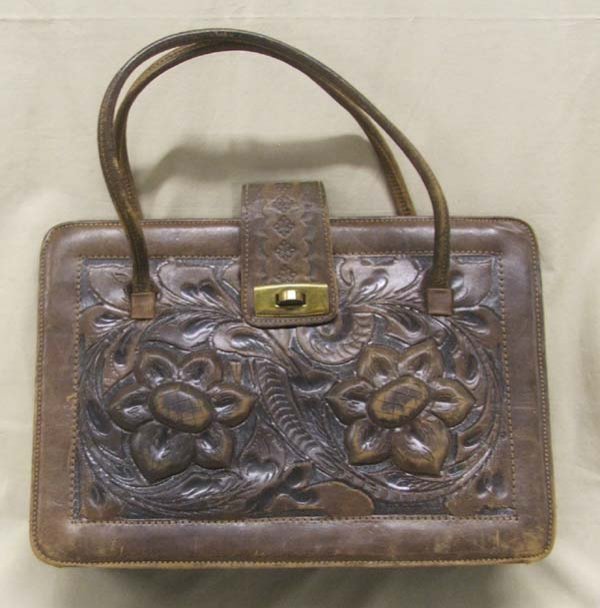 Monterey Mexico Hand Tooled Leather Hand Bag: Monterey Mexico Hand Tooled Leather Hand Bag, measures approx. 9 x 12''. SHI $20.