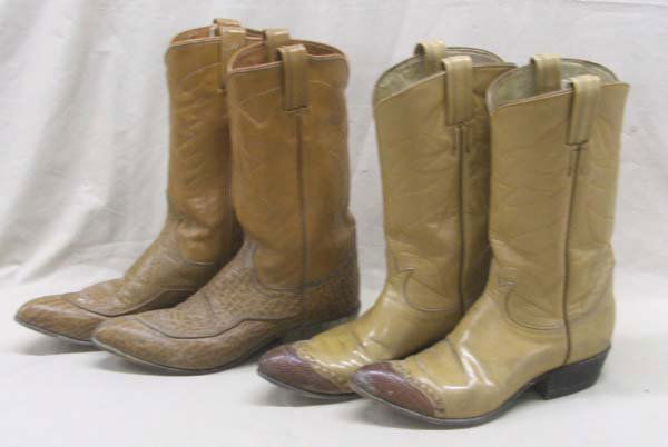 2 Pair Tony Lama Boots: 2 Pair Tony Lama Boots, smallest pair measures approx. 10'' toe to heel, larger pair measures approx. 11'' toe to heel. SHI $25.