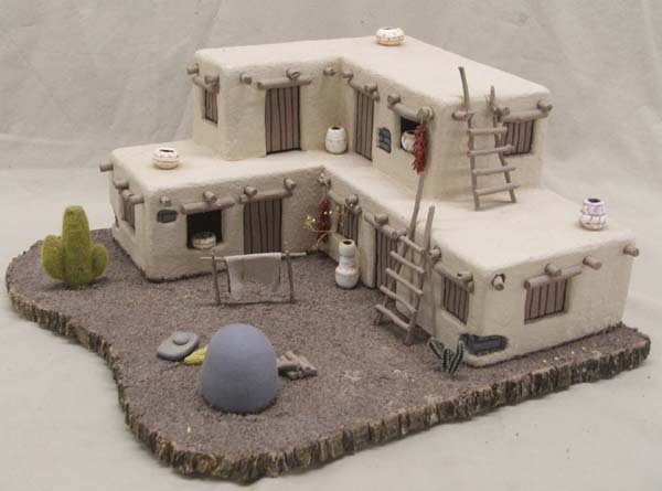 Santa Fe Casas Adobe Minature on Wood Base: Santa Fe Casas Adobe Model on Wood Base. Measures 15''x13''x6.75''. SHI $35.