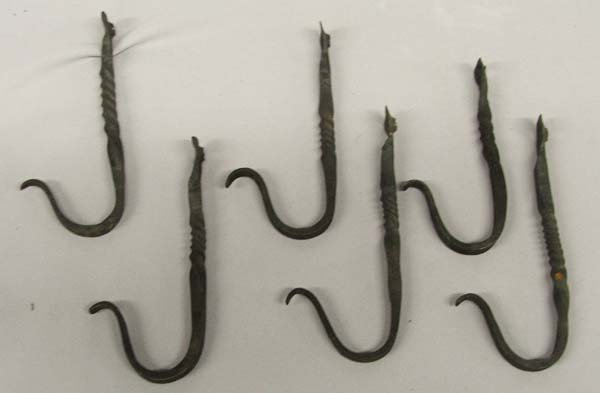 6 Hand Forged Cast Iron Wall Hooks: 6 Hand Forged Wall Hooks. The longest hook is 5.5''. SHI $20.