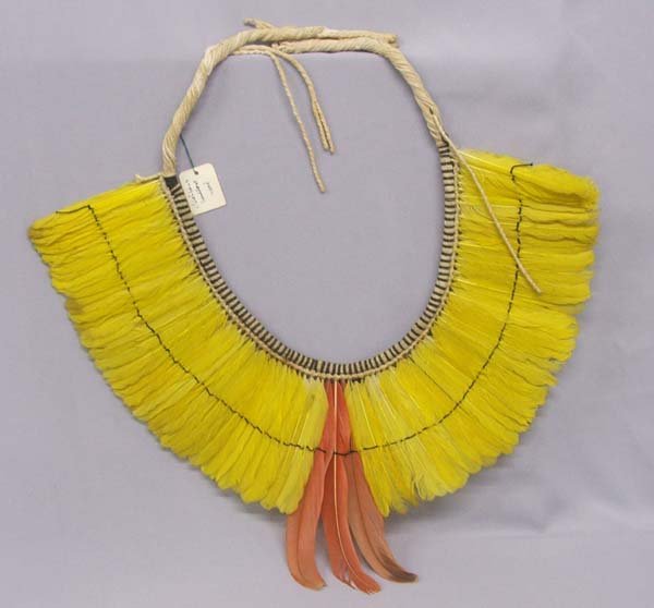 Brazilian Parrot Feather Headdress : Brazilian Yellow Parrot Feather Headdress, measures approx. 38'' long x 8'' long longest feather. SHI $30.