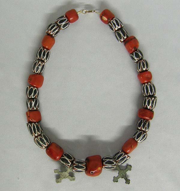 Red Coral Hudson Bay Cross Necklace By Young: Red Bamboo Coral Necklace With Hudson Bay Crosses designed by artist By Judith Young, measures approx. 18'', crosses 1.25'' x 1.25''. Crosses are marked HB. 14Kt gold clasp. SHI $20.