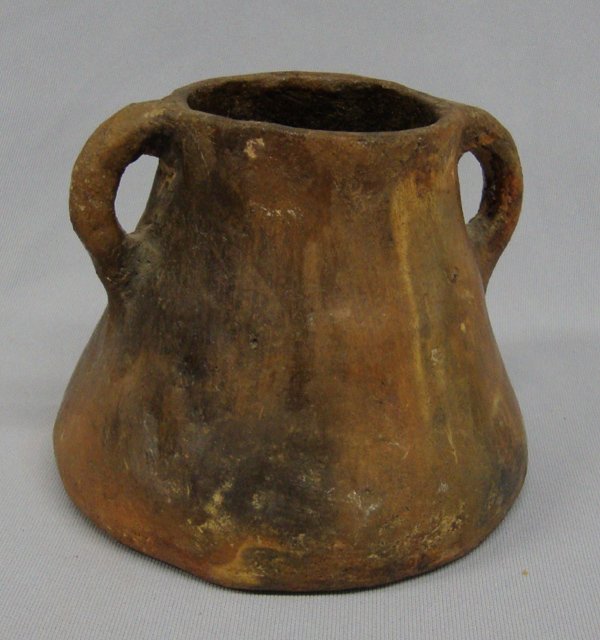 Navajo Older Pottery Water Jug With Handles: Navajo Older Pottery Water Jug With Handles. Measures 4.5''x4.5''. SHI $20.