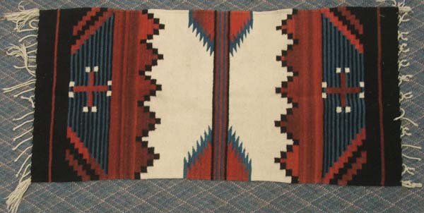 Mexican Wool Throw Rug: Mexican Wool Throw Rug, measures approx. 25.5'' x 55'', fringe is 3 1/2''. SHI $20.