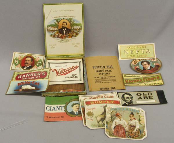 Vintage Cigar Label Collection In Tobacco Box: Collection Of Cigar Labels In Tobacco Box, box measures approx. 3/4''H x 7 1/4''L x 5 1/3''W. SHI $15.