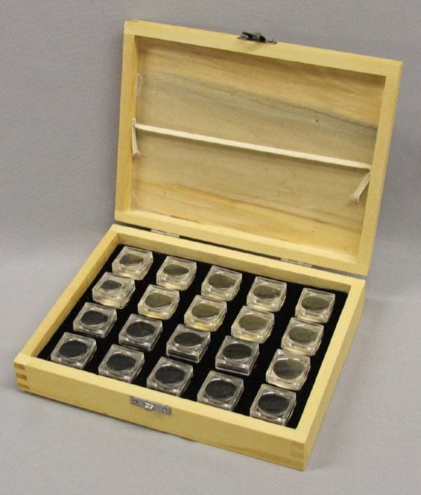 20 Rock Specimen Magnifying Boxes In Wood Case: 20 Rock Specimen Magnifying Boxes In Wood Case. Each specimen box measures approx. 3/4''H x 1'' square. Carrying box measures approx. 1 3/4''H x 8 1/2''L x 6 1/2''W. SHI $20.