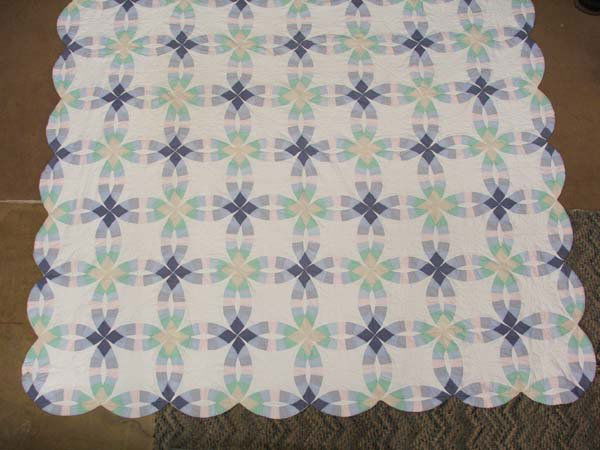 Antique Double Wedding Ring Cotton Quilt: Antique Double Wedding Ring Cotton Quilt. Approximately 8 Stitches Per Inch. Measures 80''x80''. SHI $25.