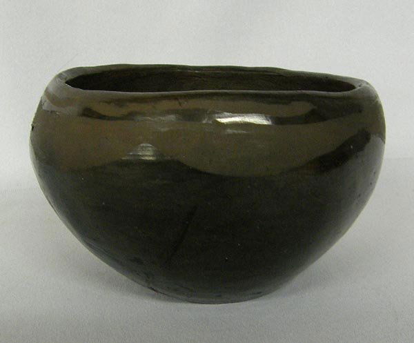 Vintage San Ildefonso Pottery Bowl: Vintage San Ildefonso Pottery Bowl. Measures 3''x4.5''. SHI $20.