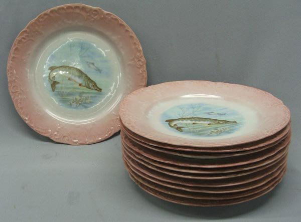 11 Antique Victoria Carlsbad Austrian Fish Plates: 11 Antique Victoria Carlsbad Austrian Fish Design Plates. Measures approx. 8.5''. SHI $25.