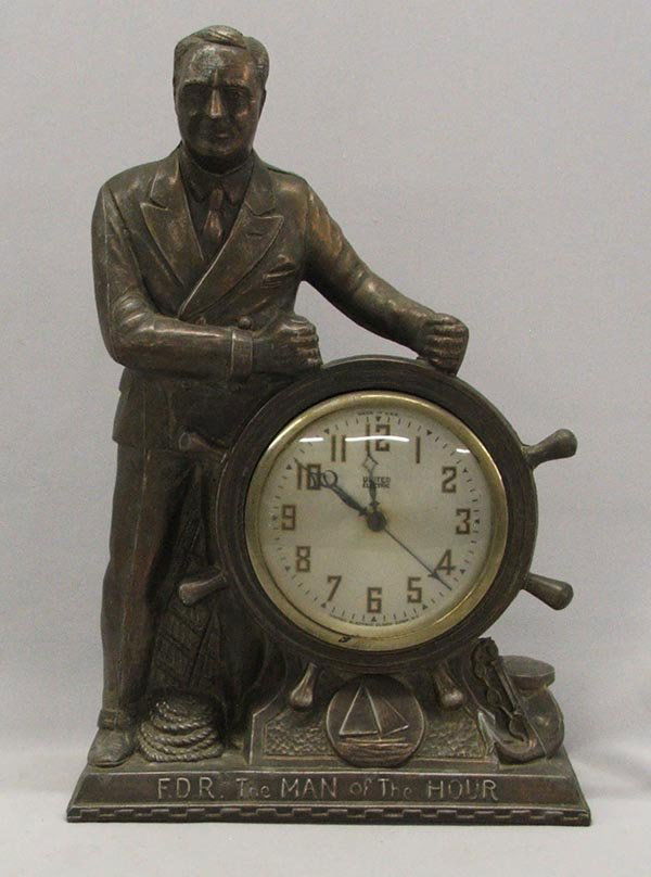 Metal United Electric Clock FDR The Man Of The Hour: United Electric Clock ''FDR The Man Of The Hour''. Clock is not secure, back is missing. Measures approx. 14'' x 9'' x 4''. SHI $40.