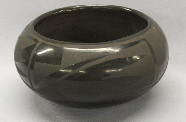 Vintage San Ildefonso Black Pottery Bowl: Vintage San Ildefonso Black Pottery Bowl. Measures 3.5''x6.5''. SHI $25.