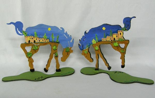 Cast Iron Horses Hand Painted By Kills Thunder: Cast Iron Horses Hand Painted By Kills Thunder. Measures approx. 8 1/2''H x 10''L. SHI $25.