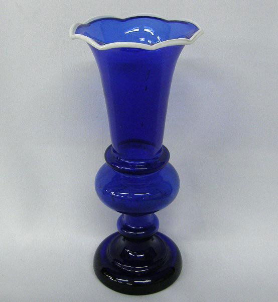 Vintage Cobalt Blue Hand Blown Cased Glass Vase: Vintage Cobalt Blue Hand Blown Cased Glass Vase, possibly Sandwich Glass. Measures approx. 8 1/2'' tall. SHI $25.