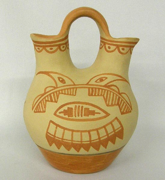 Jemez Pottery Wedding Vase by Jose Ray Toledo: Jemez Pottery Wedding Vase Signed on the bottom, ''Mr. and Mrs. Jose Ray Toledo, Jemez Pueblo, NM.'' Measures 7''x6''. SHI $20.