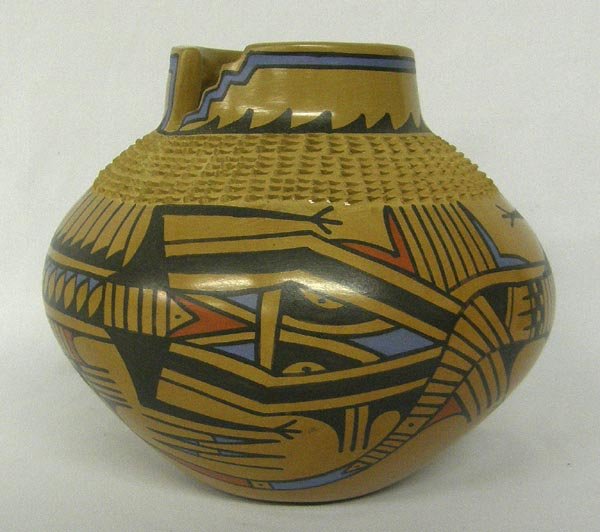 Mata Ortiz Cutaway Rim Lizard Pottery by J Tena: Mata Ortiz Cutaway Rim Lizard Pottery by Jesus Tena. Measures 6.5''x7.5''. SHI $25.