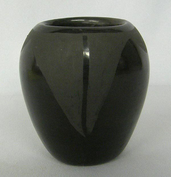 1960s San Ildefonso Jar: 1960s San Ildefonso Jar. Measures 3.25'' x 3''. SHI $20.