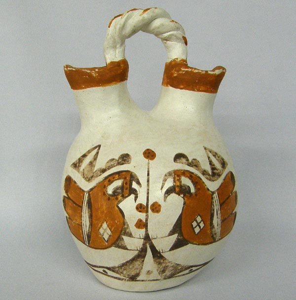 Vintage Acoma Wedding Vase Signed Lucy M Lewis: Vintage Acoma Wedding Vase Signed Lucy M Lewis. Handle has been glued. Measures 7.5''x5.5''. SHI $25.