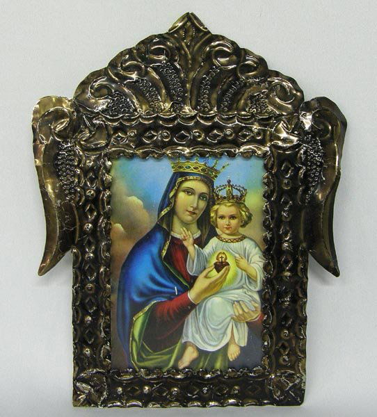 Mexican Tin Retablo: Mexican Tin Retablo. Measures 10''Hx9''W. SHI $20.