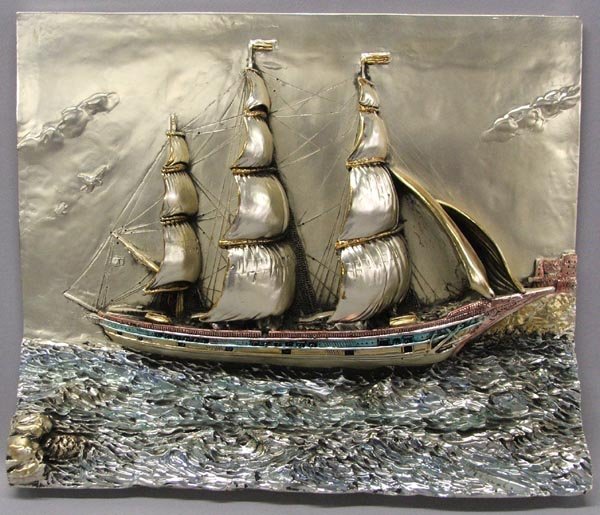 Silver Foil on Metal Ship Sculpture by Manuel: Silver Foil on Metal Ship Sculpture by Manuel. Measures approx. 12 1/4''H x 15''W x 2 1/3''D. SHI $30.
