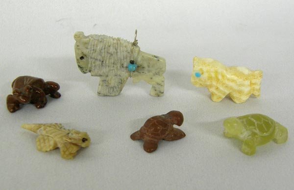 Zuni Miniature Fetish Collection: Zuni Miniature Fetish Collection. 2 Frogs, 1 Horse, 1 Buffalo, 1 lizard, 1 horny Toad. None are more than 1.5"L. buffal is the largest. Various Stone, Crystal, composition. SHI $15.
