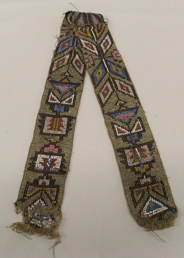 Woodland Loom Beaded Sash: Woodland Loom Beaded Sash, loose strings, fraying on ends, missing beads, measures approx. 2 1/8'' x 29'', beautiful beadwork and colors. SHI $15.