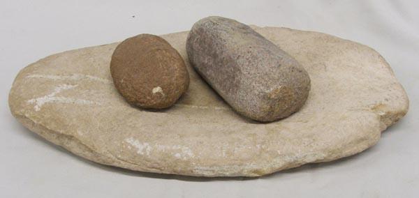 Mano Metate and Stone Tool: Mano Metate and Stone Tool, measures approx. 15'' x 8'' x 1.5. SHI $30.