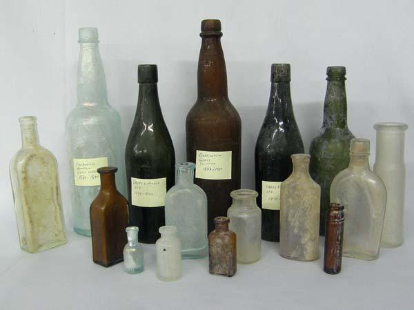 Collection of Sixteen Antique Bottles: Collection of Sixteen Antique Bottles, some identification includes: Frederick Hampton Glass Works 1880-1900, Burlington Glass Company 1877-1909, Pience Glass Co. 1905-1917, Two Davey & Moore Ltd. 187