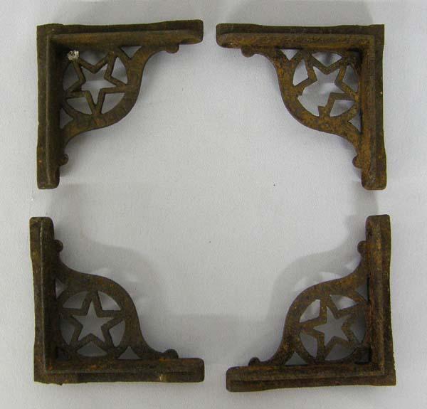 4 Antique Cast Iron Star Table Brackets: 4 Antique Cast Iron Star Table Brackets, measures approx. 3 1/2'' x 3 1/2''. SHI $20.