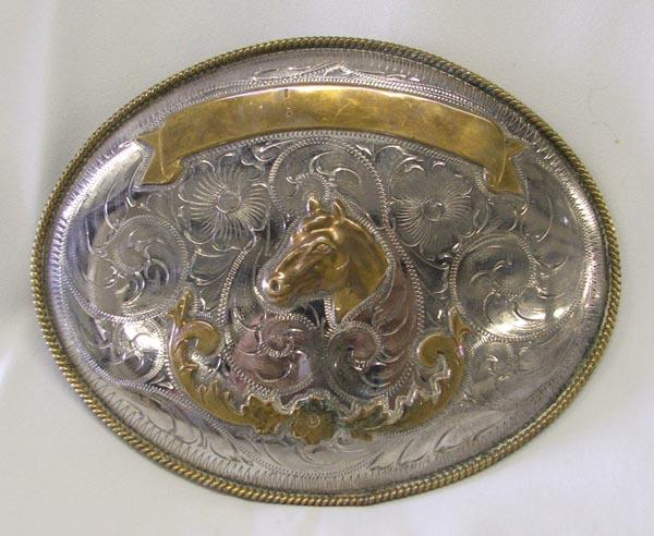 Mexican Cowboy Trophy Belt Buckle: Mexican Cowboy Trophy Belt Buckle, Alpaca Silver, measures approx. 5'' x 6.5''. SHI $15.