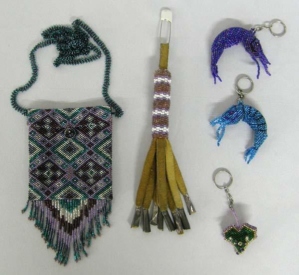 Hand Beaded Keychains and Bag by Kills Thunder: Hand Beaded Keychains and Bag by Kills Thunder, bag measures approx. 23.5'' x 2.5''. SHI $15.