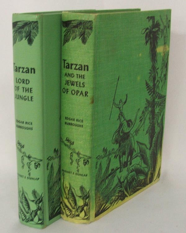 2 Tarzan Books by Edgar Rice Burroughs: 2 Tarzan Books by Edgar Rice Burroughs, titles include Tarzan Lord of the Jungle copyright 1928 and Tarzan and the Jewels of Opar copyright 1918, measures 7.75'' x 5.5''. SHI $15.