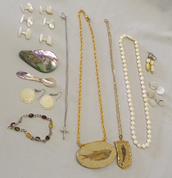 Collection of Estate Jewelry: Collection of Estate Jewelry, includes earrings, necklaces, bracelet, cufflinks, abalone and fossil pendants, longest necklace measures approx. 22'' with a fossil pendant measuring 1.75'' x 2.75''. SH